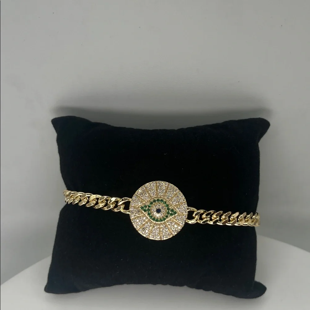 045. 18k Gold Plated Evil Eye Bracelet with green accents 7 1/4”